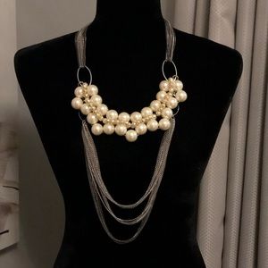 Pearl and chain statement necklace.